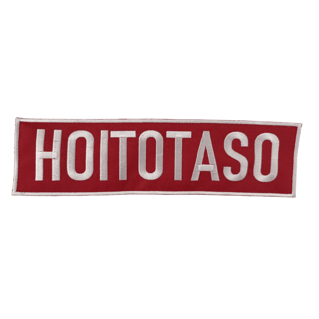 HOITOTASO Selkäkyltti - Brodeerattu